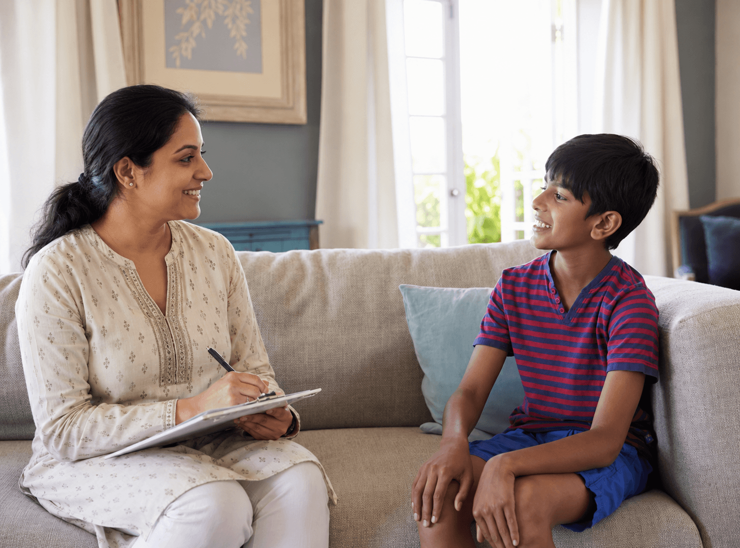 A mindset coach in a supportive one-on-one conversation with an alcovian